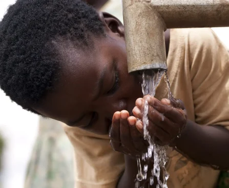 kid drinking from tape